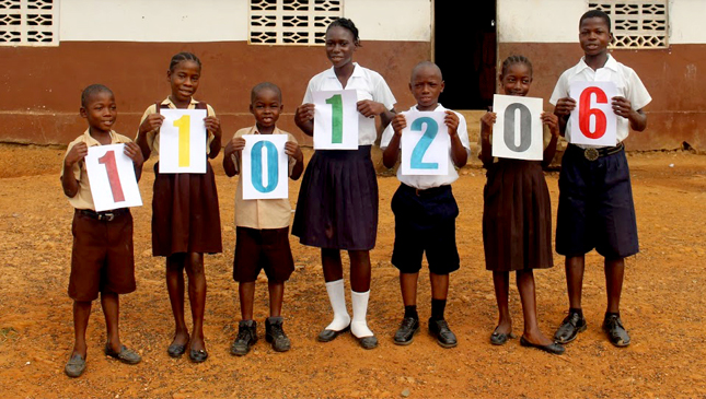 Children from John Parvola Primary School in Liberia celebrate!